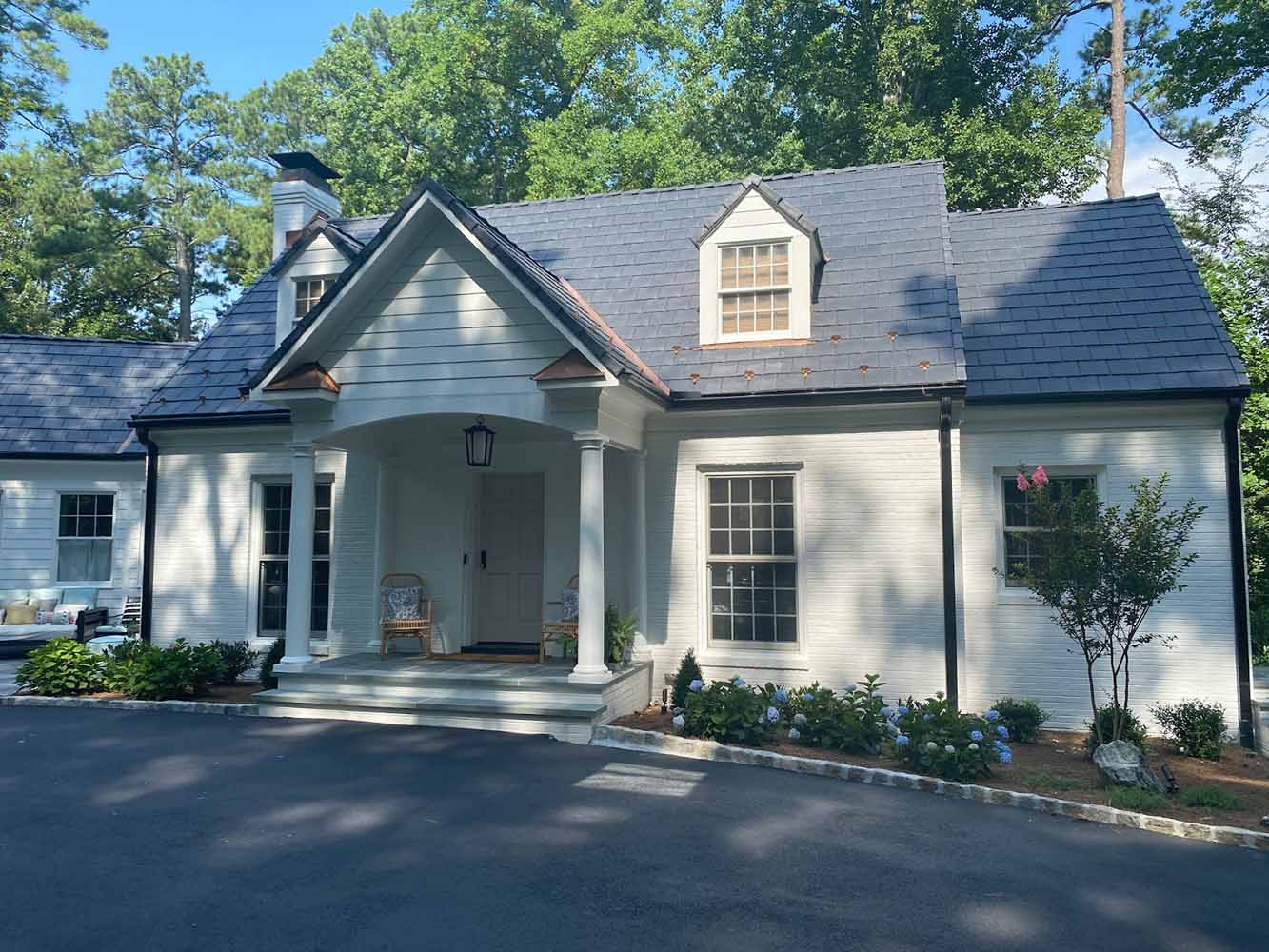 New Davinci slate roof with custom copper flashing and trim detail really improved the curb appeal of this home