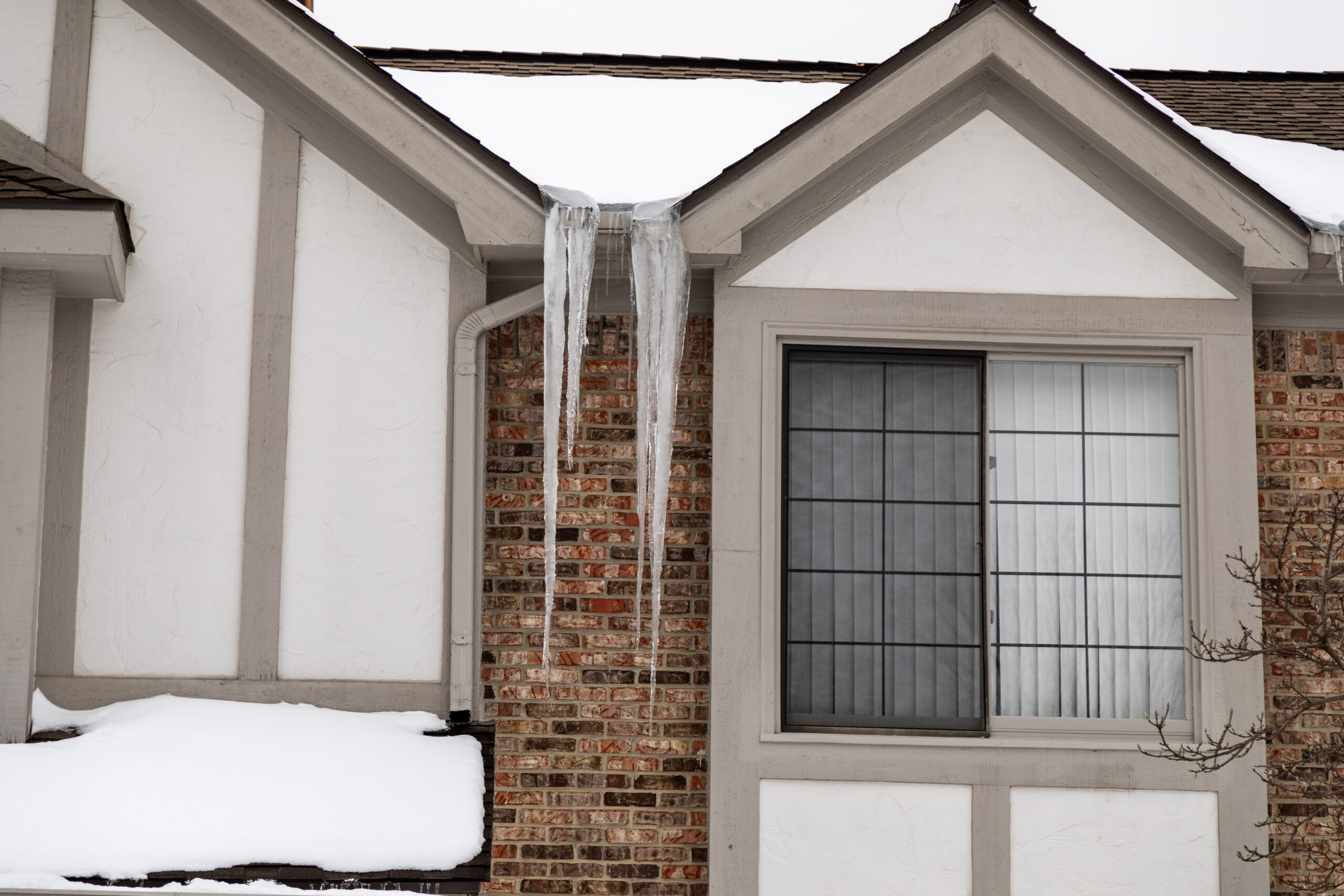 Ice Sickle Damming on Roof