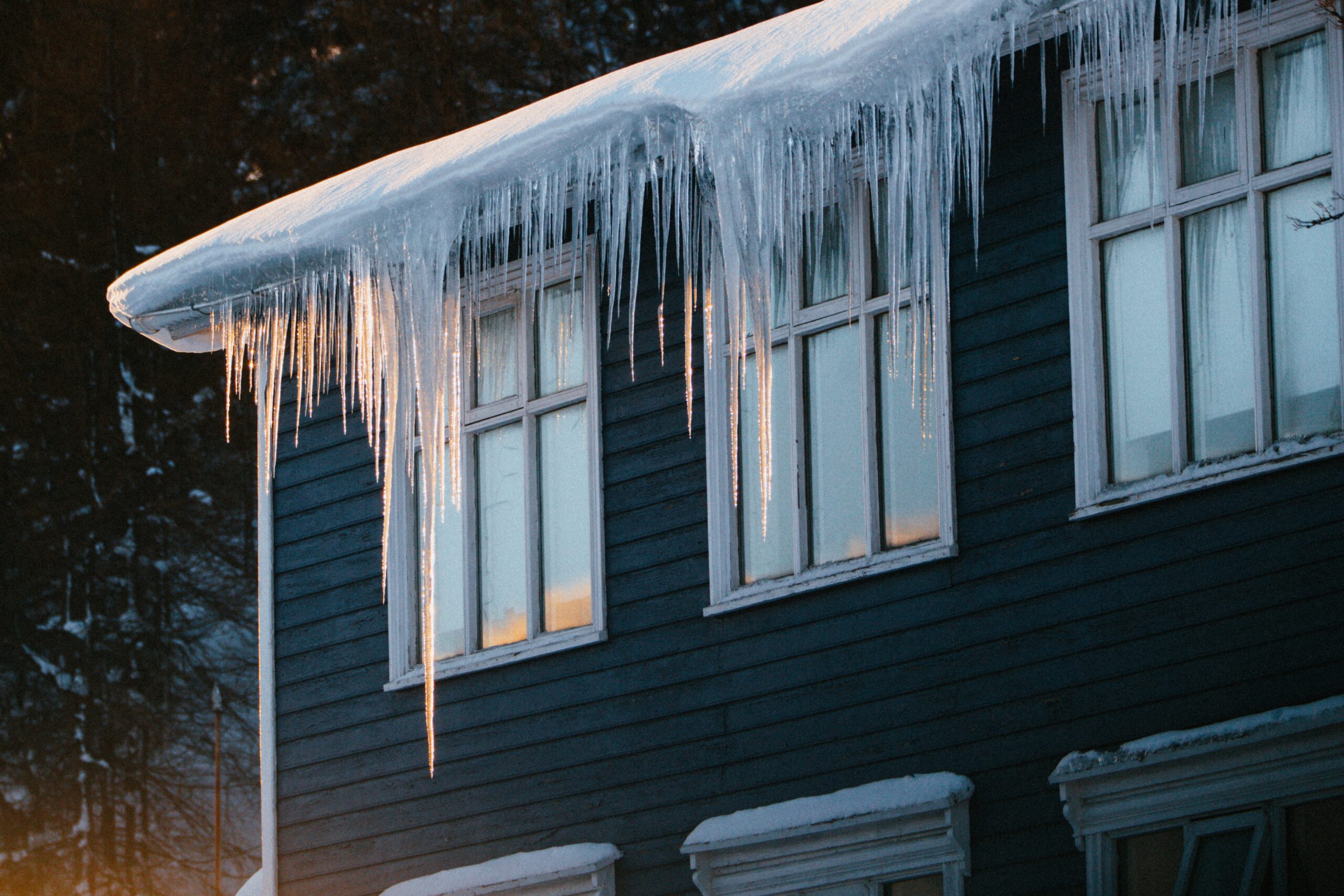 House with icicles and ice dams