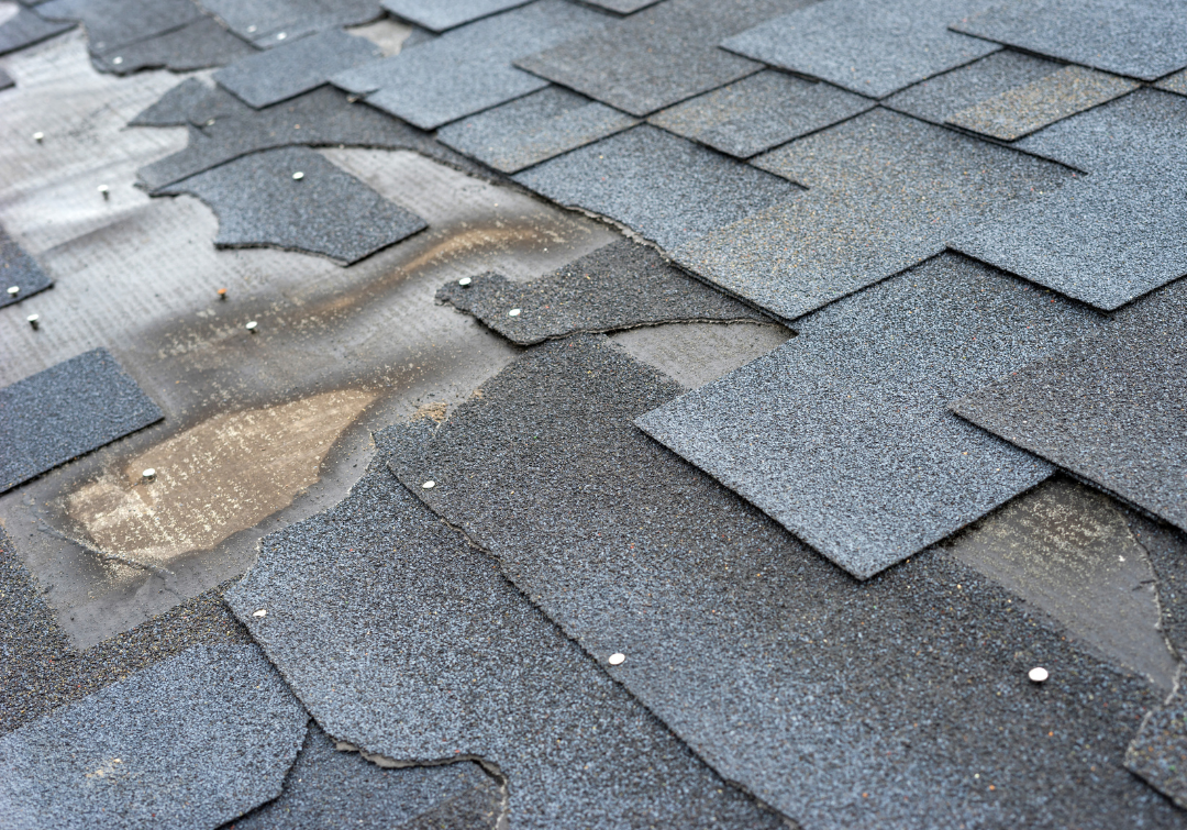 Close-up of a damaged roof with 